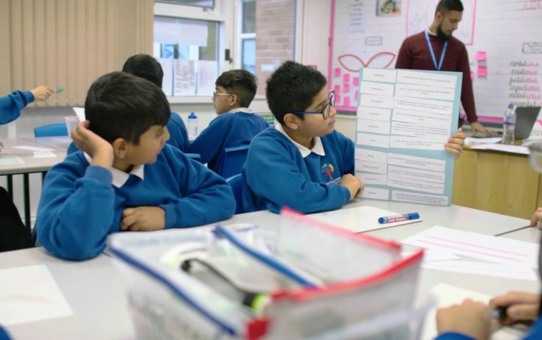 Two primary school children working together at an Oracy in Action workshop