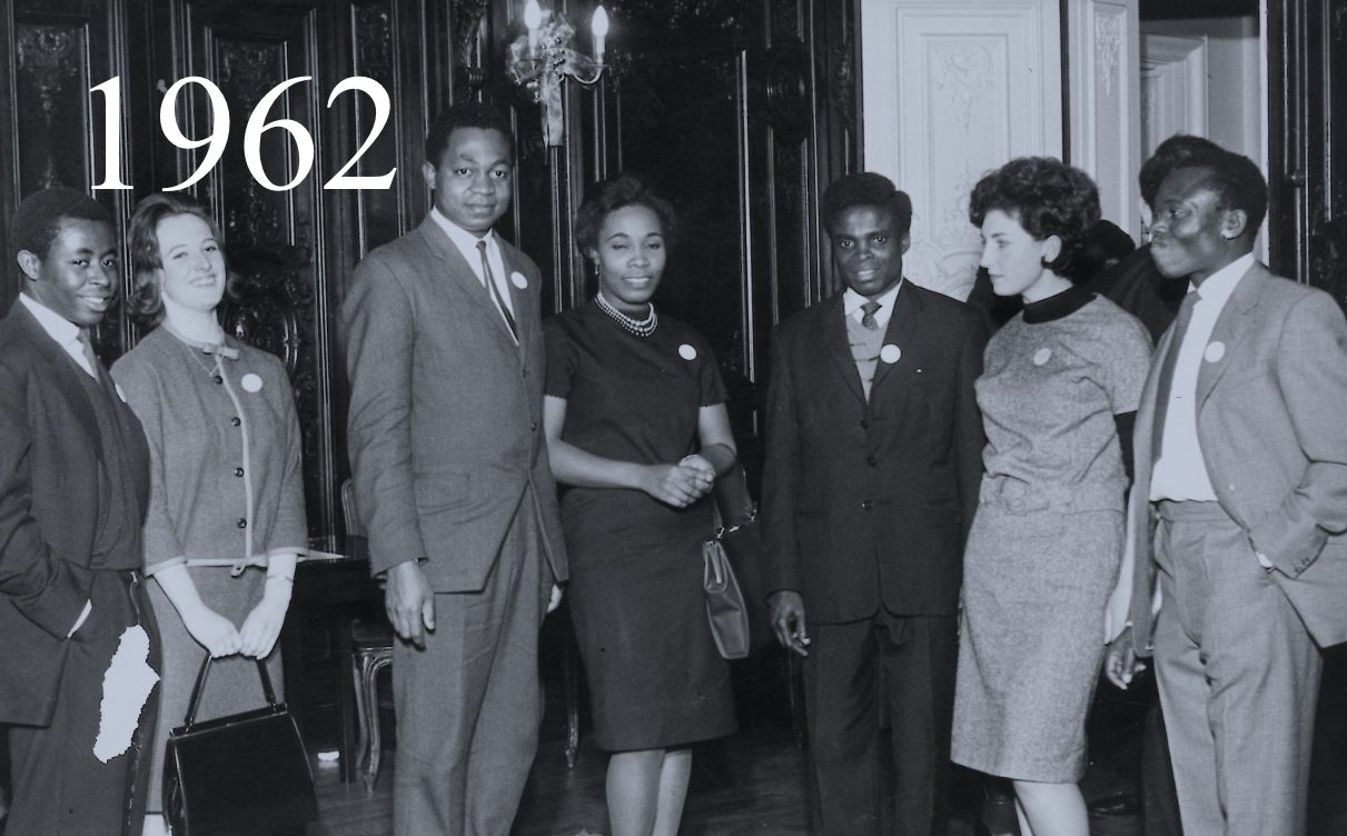 A group of students enjoy share a smile at the Christmas party in 1962