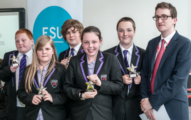 5 pupils and a teacher posing with their awards