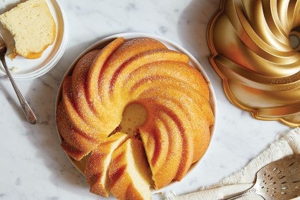 Bundt cake next to Bundt pan