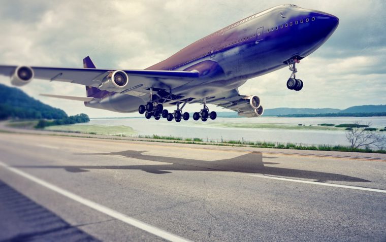A picture of a planning taking off from a runway