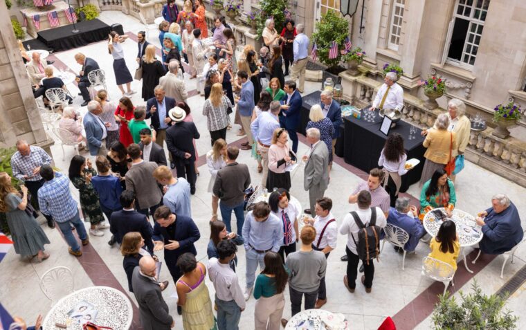 People enjoying themselves in the Courtyard in Dartmouth House