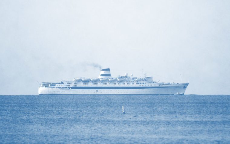 a 1920s passenger liner sails across the ocean