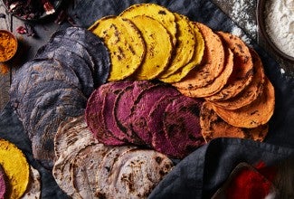 Different colors of tortillas next to each other