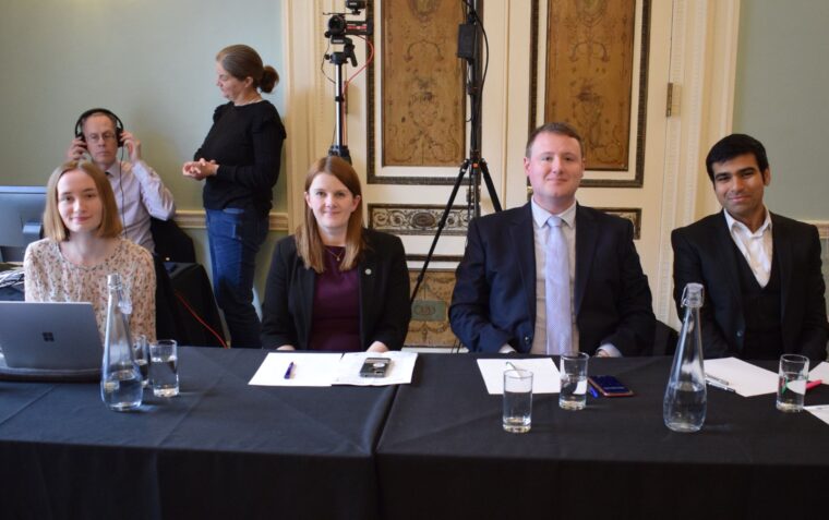 Volunteer judges for the ESU sat at a table